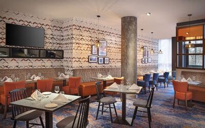 Dining area perfect for coworking at Leonardo Hotel Exeter.