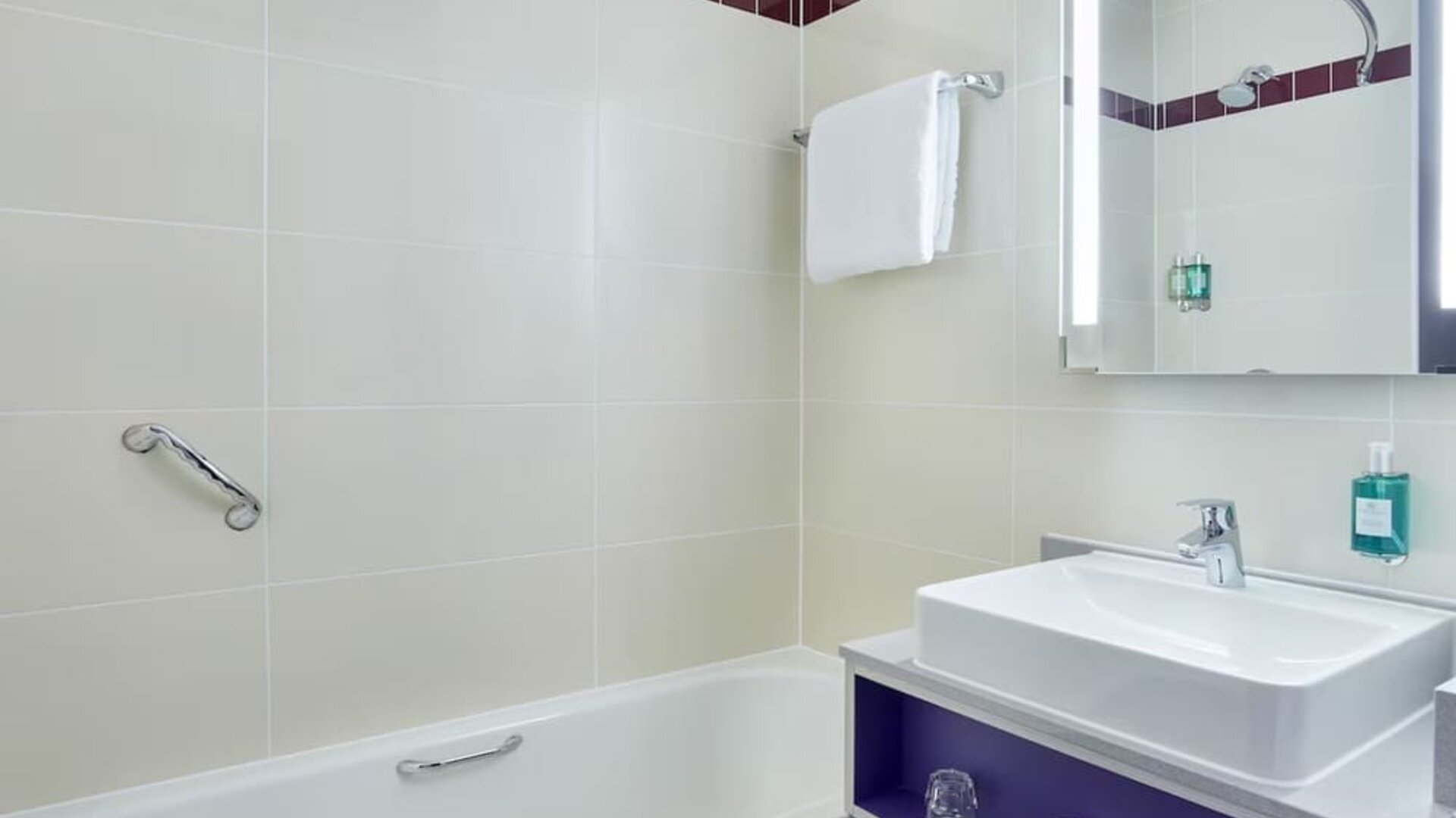 Guest bathroom with shower at Leonardo Hotel Exeter.
