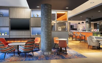 Lobby and coworking lounge at Leonardo Hotel Exeter.