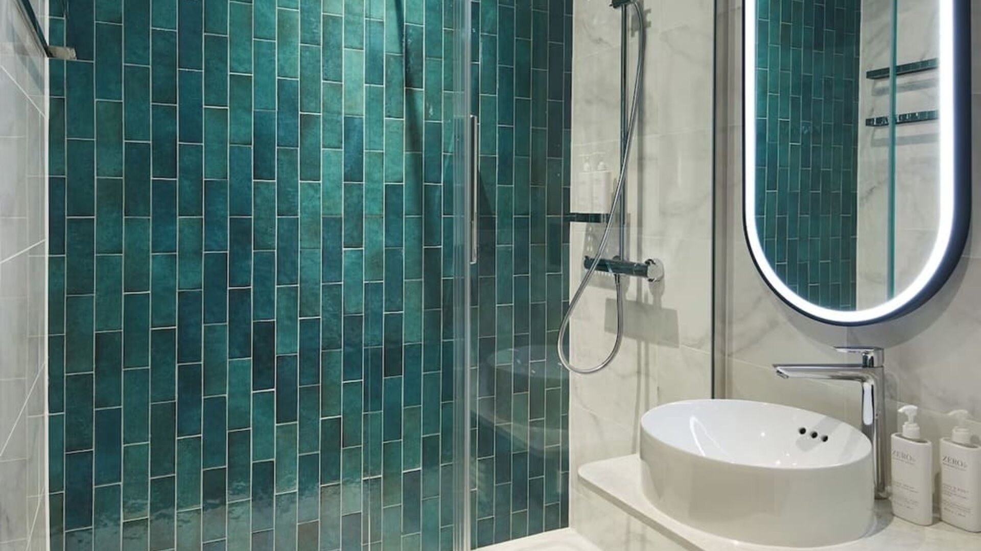 Guest bathroom with shower at Leonardo Royal Hotel Glasgow.