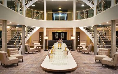 Seats available outside conference rooms at Leonardo Hotel And Conference Venue Hinckley Island. 