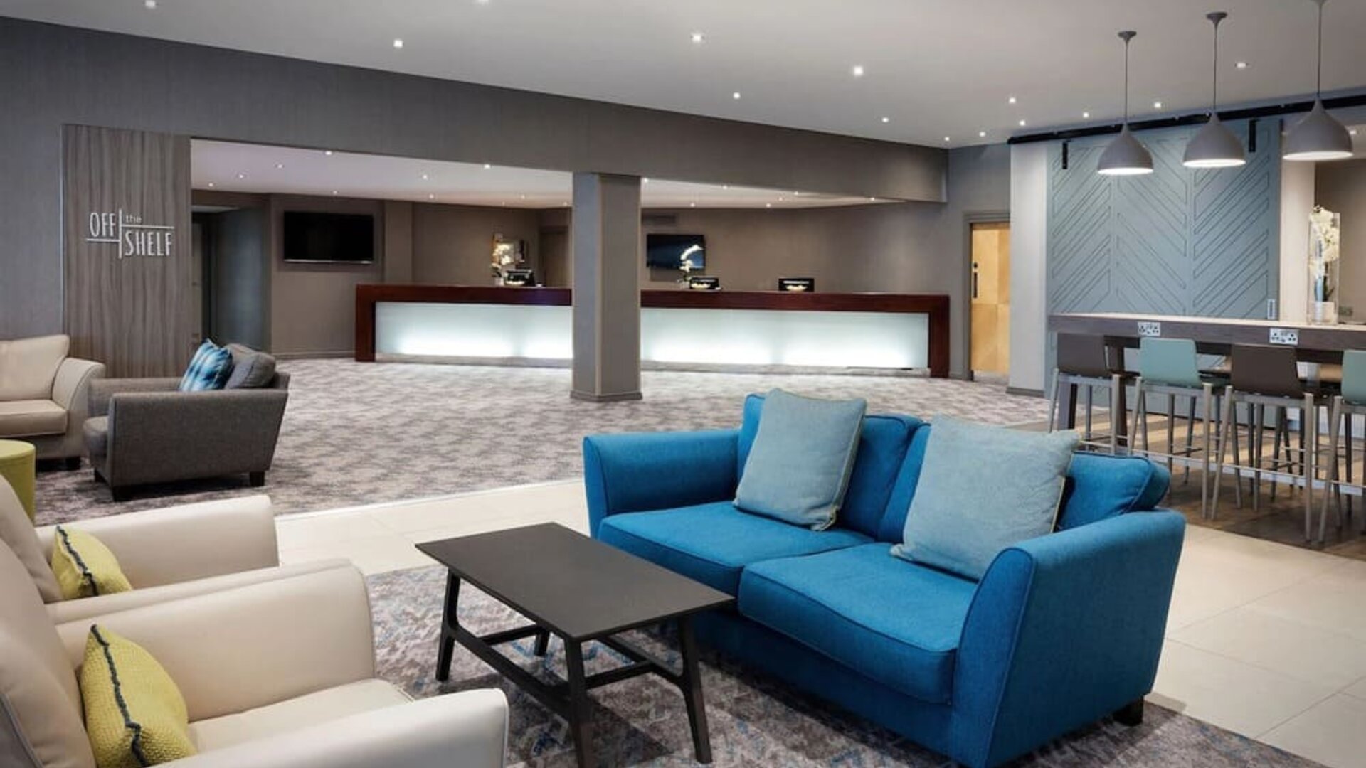 Lobby and coworking lounge at Leonardo Royal Hotel Oxford.