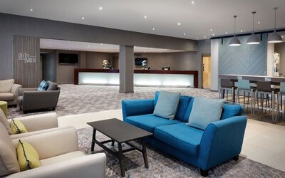 Lobby and coworking lounge at Leonardo Royal Hotel Oxford.