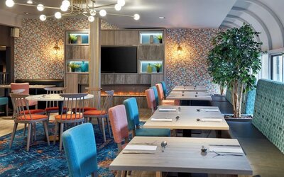Dining area perfect for coworking at Leonardo Hotel Edinburgh Murrayfield.