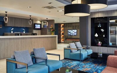 Lobby and coworking lounge at Leonardo Hotel Edinburgh Murrayfield.