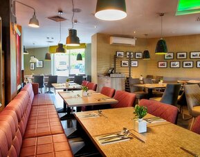 Dining area perfect for coworking at Leonardo Royal Hotel Edinburgh Haymarket. 