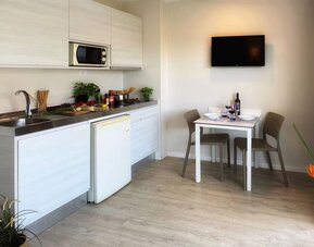 Kitchen available at INN Mallorca Aparthotel.