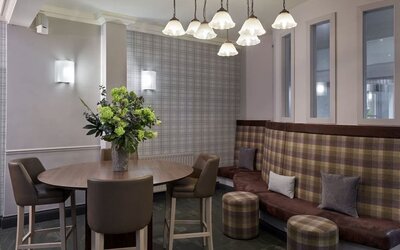 Lobby and coworking lounge at Leonardo Hotel Edinburgh City.