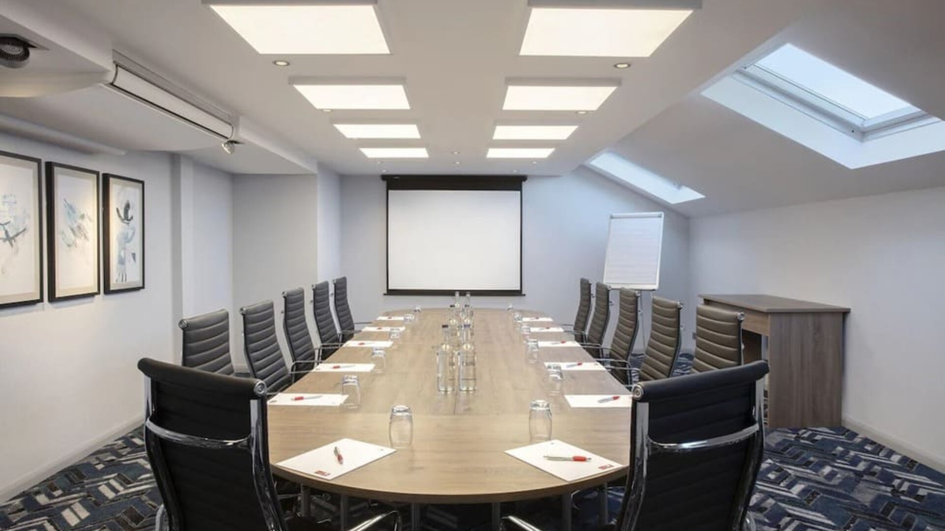 Professional meeting room at Leonardo Hotel London Heathrow Airport.