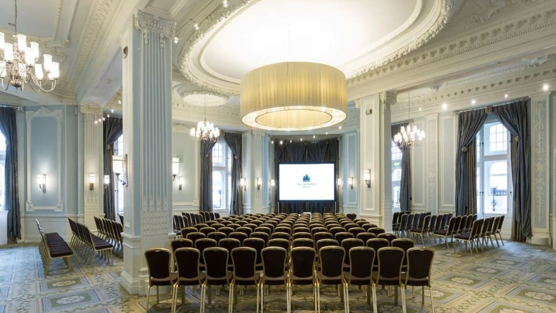 Elegant banquet hall with decorative chandeliers at The Midland - A Leonardo Royal Hotel.