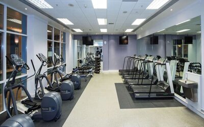 Fully equipped fitness center at DoubleTree by Hilton Dartford Bridge.