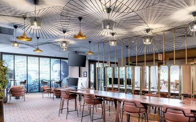 Lobby and coworking lounge at Hilton Garden Inn London Heathrow Airport.