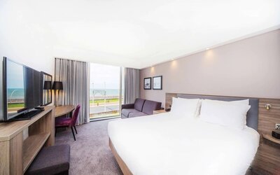 Day use room with work desk and sofa at Hampton By Hilton Blackpool.