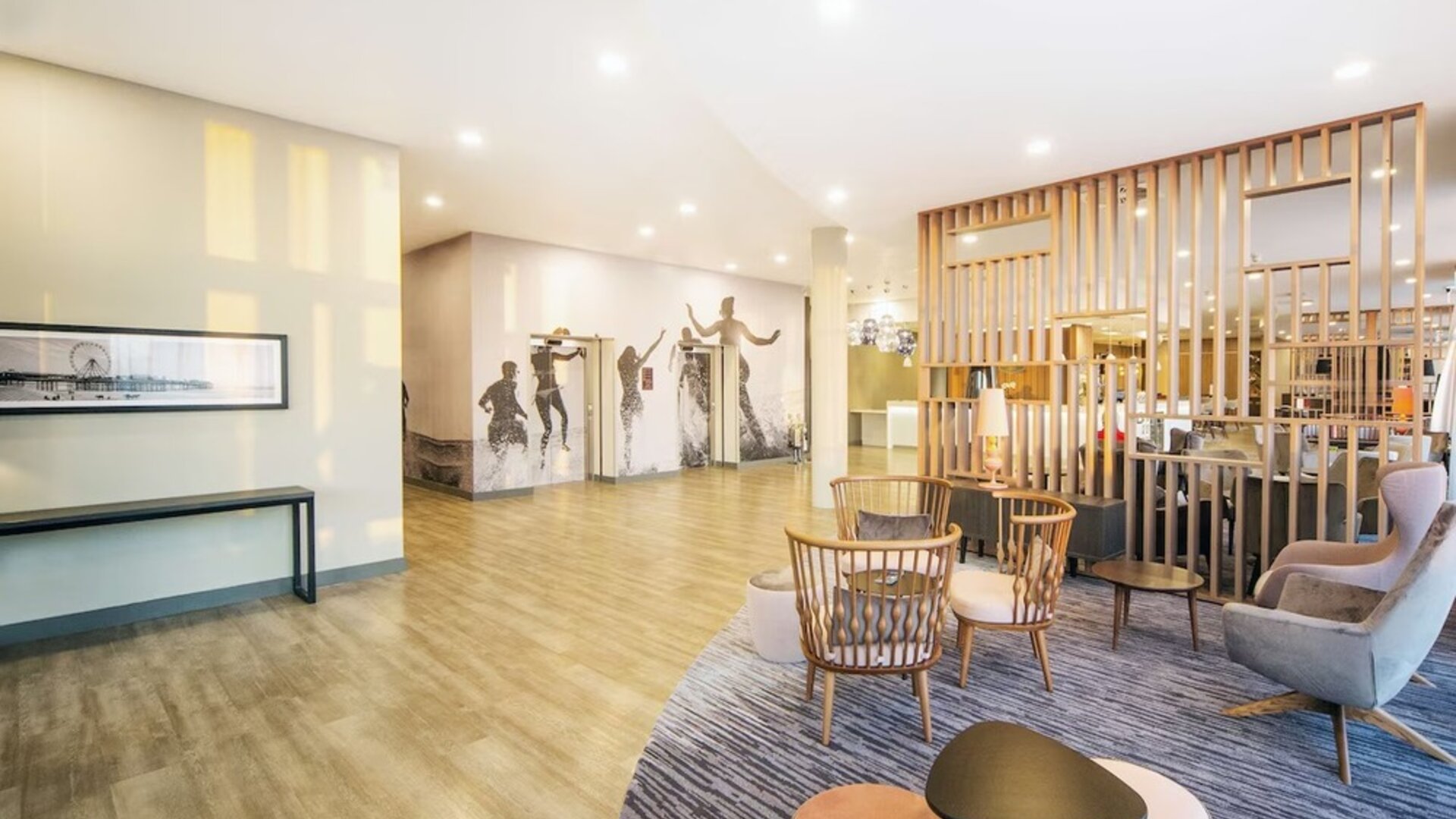 Lobby and coworking lounge at Hampton By Hilton Blackpool. 