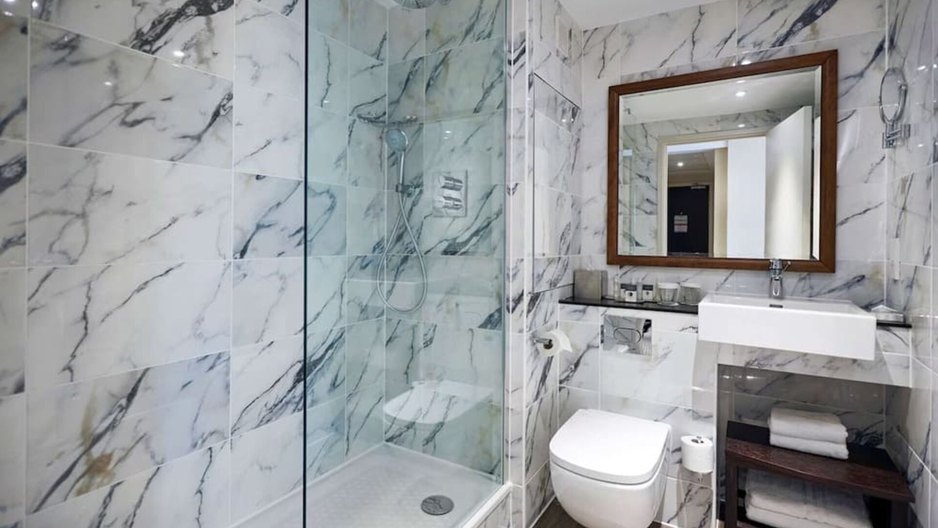 Guest bathroom with shower at DoubleTree By Hilton London Excel.
