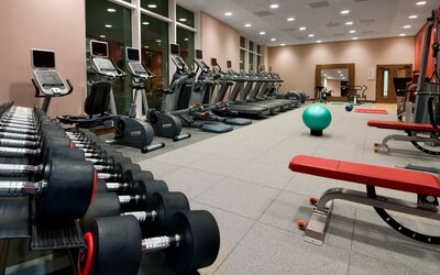 Fitness center with treadmills and machines at the Hilton Reading.