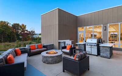 Outdoor seating at TownePlace Suites Edgewood Aberdeen.