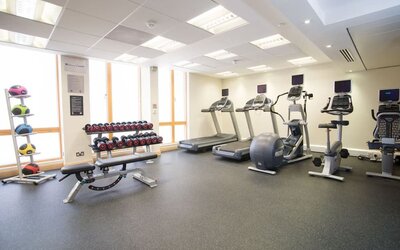 Fitness center with treadmills, machines and equipment at the Hilton Garden Inn Birmingham Brindleyplace.