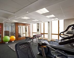 Fitness center with treadmills, machines and equipment at the Hilton Garden Inn Birmingham Brindleyplace.