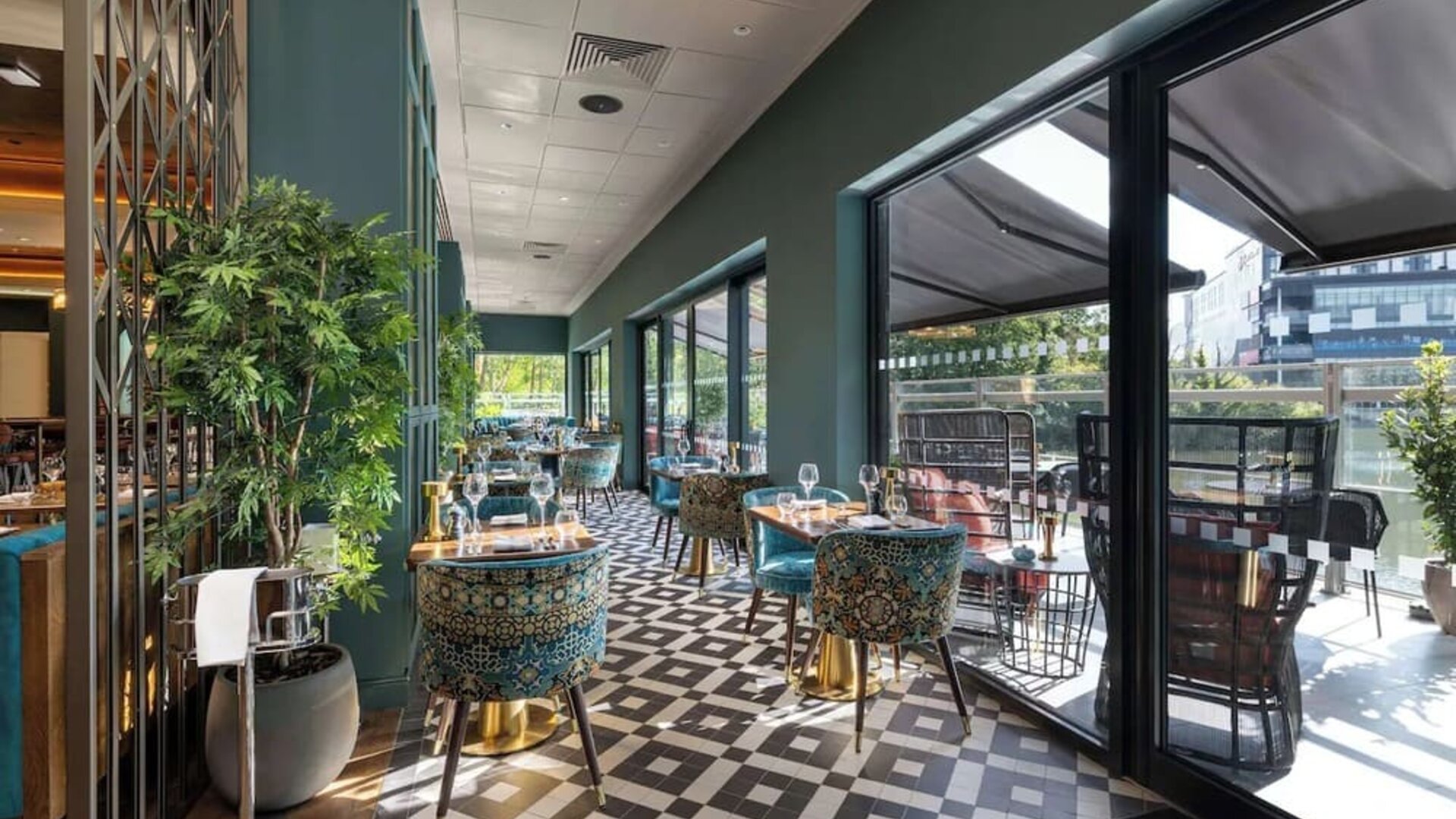 Hotel restaurant with lake view at the Hilton Birmingham Metropole.