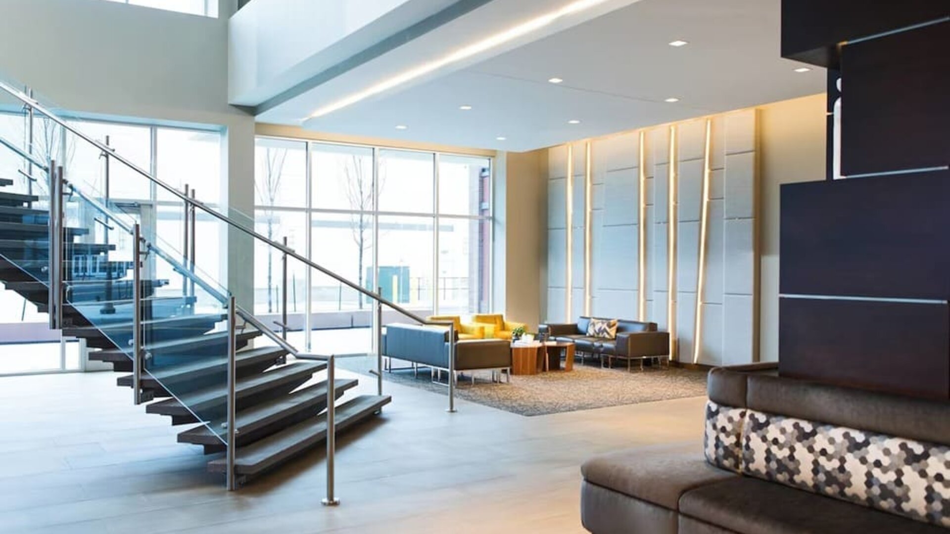 Lobby and coworking lounge at AC Hotel Cincinnati At Liberty Center.