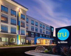 Hotel exterior with modern architecture and welcoming entrance at Tru By Hilton Lithia Springs.