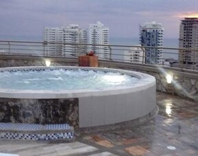 Travelers Apartamentos y Suites Santa Marta