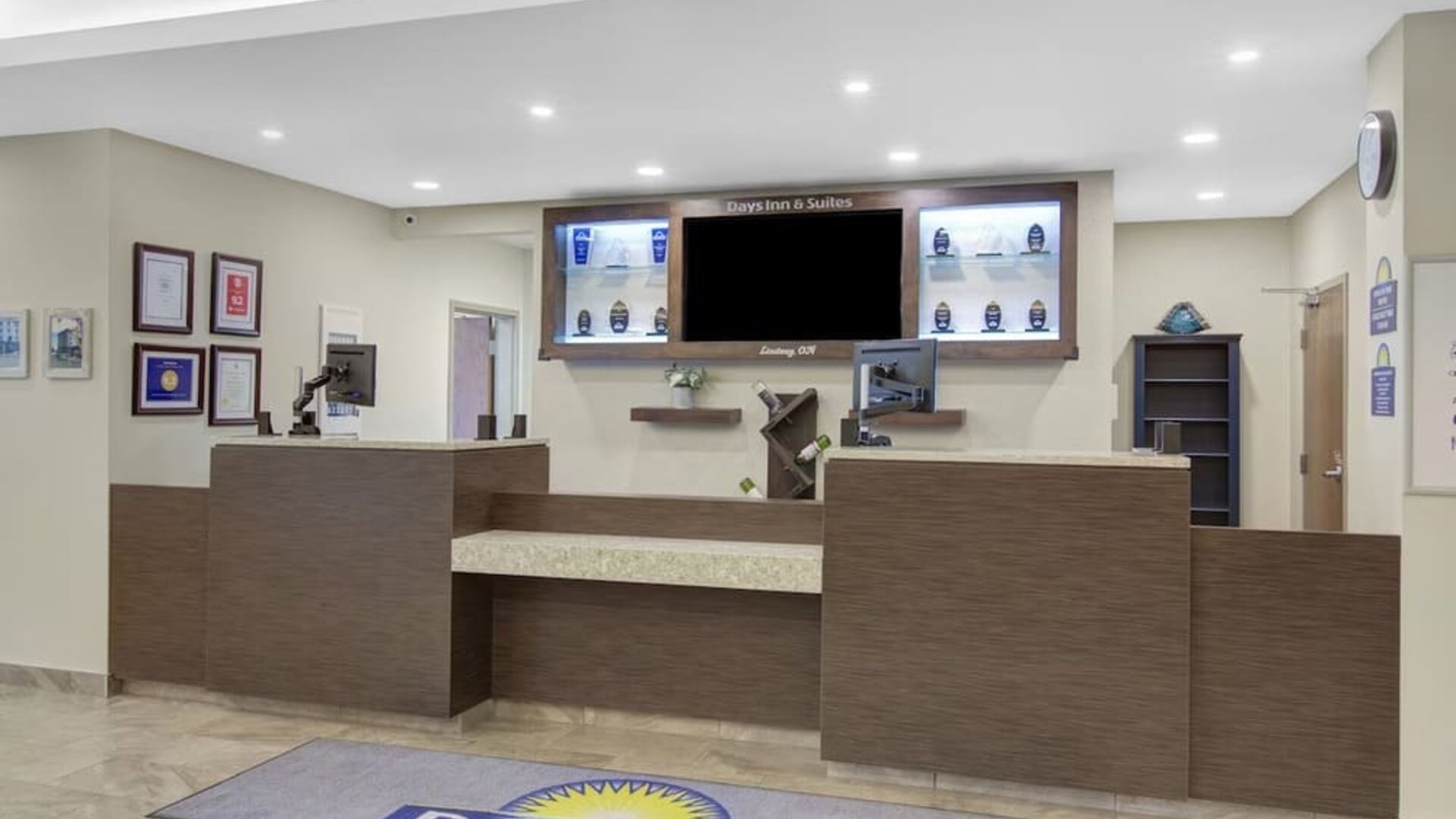 Front desk reception area with friendly check-in space at Days Inn & Suites By Wyndham Lindsay.