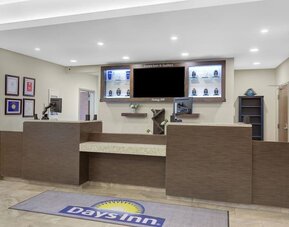 Front desk reception area with friendly check-in space at Days Inn & Suites By Wyndham Lindsay.