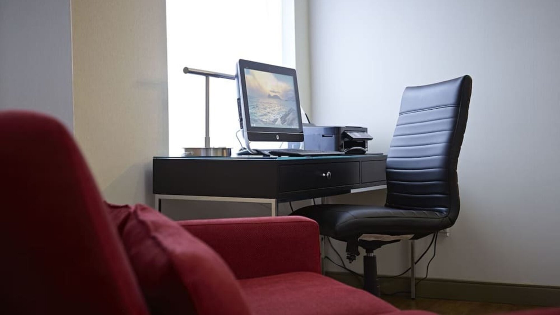 Business center equipped with computer, printer, and workspace for guest convenience at Comfort Inn Amherst.