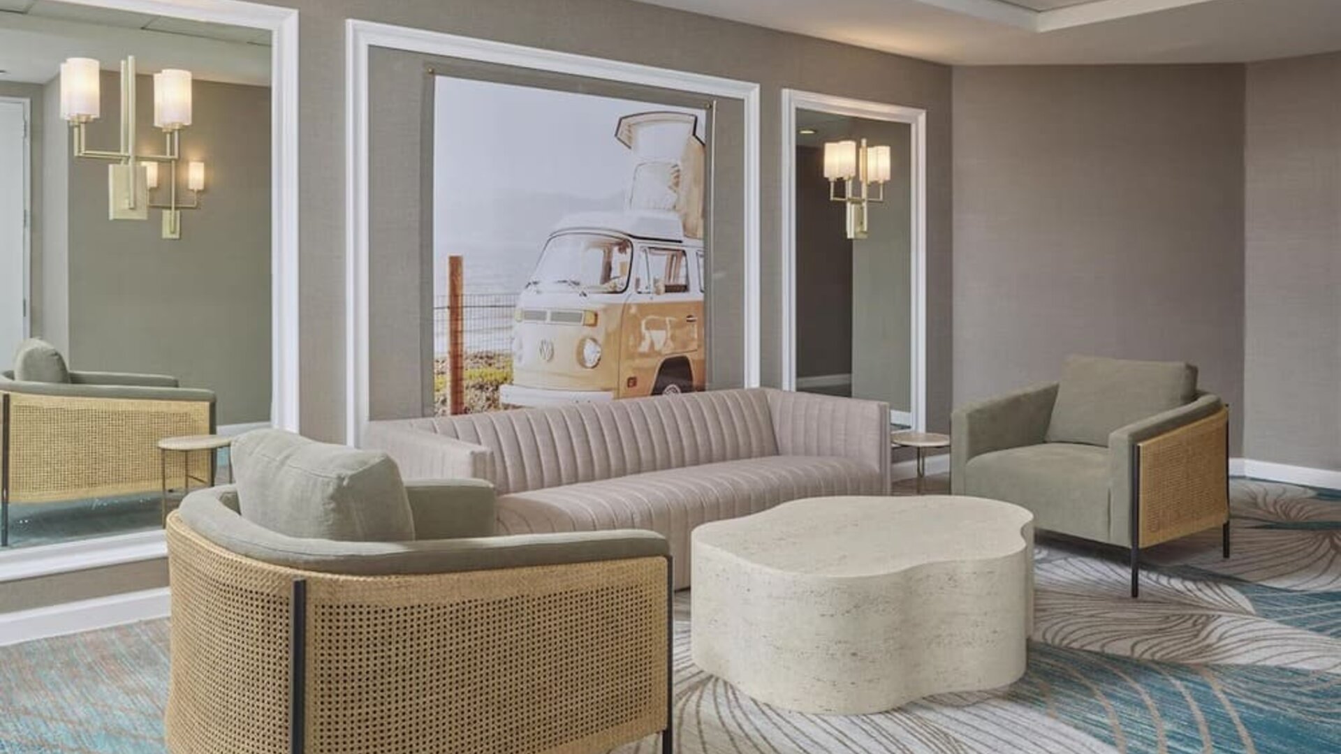 Stylish lobby seating area featuring modern furnishings, designer décor, and inviting spaces for guests to unwind at Hyatt Centric Delfina Santa Monica.