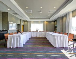 Flexible meeting room arranged in a U-shape for conferences and business events at Fairfield Inn & Suites Guelph.