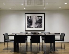 Modern meeting room with flexible seating and audiovisual capabilities for corporate meetings and private events at ARC The Hotel Ottawa.