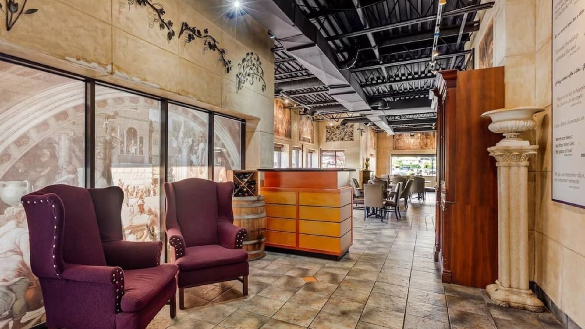Restaurant entrance with lounge seating at Comfort Inn Brantford.