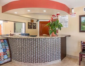 Hotel reception desk at Glenridge Inn Glendale Pasadena.