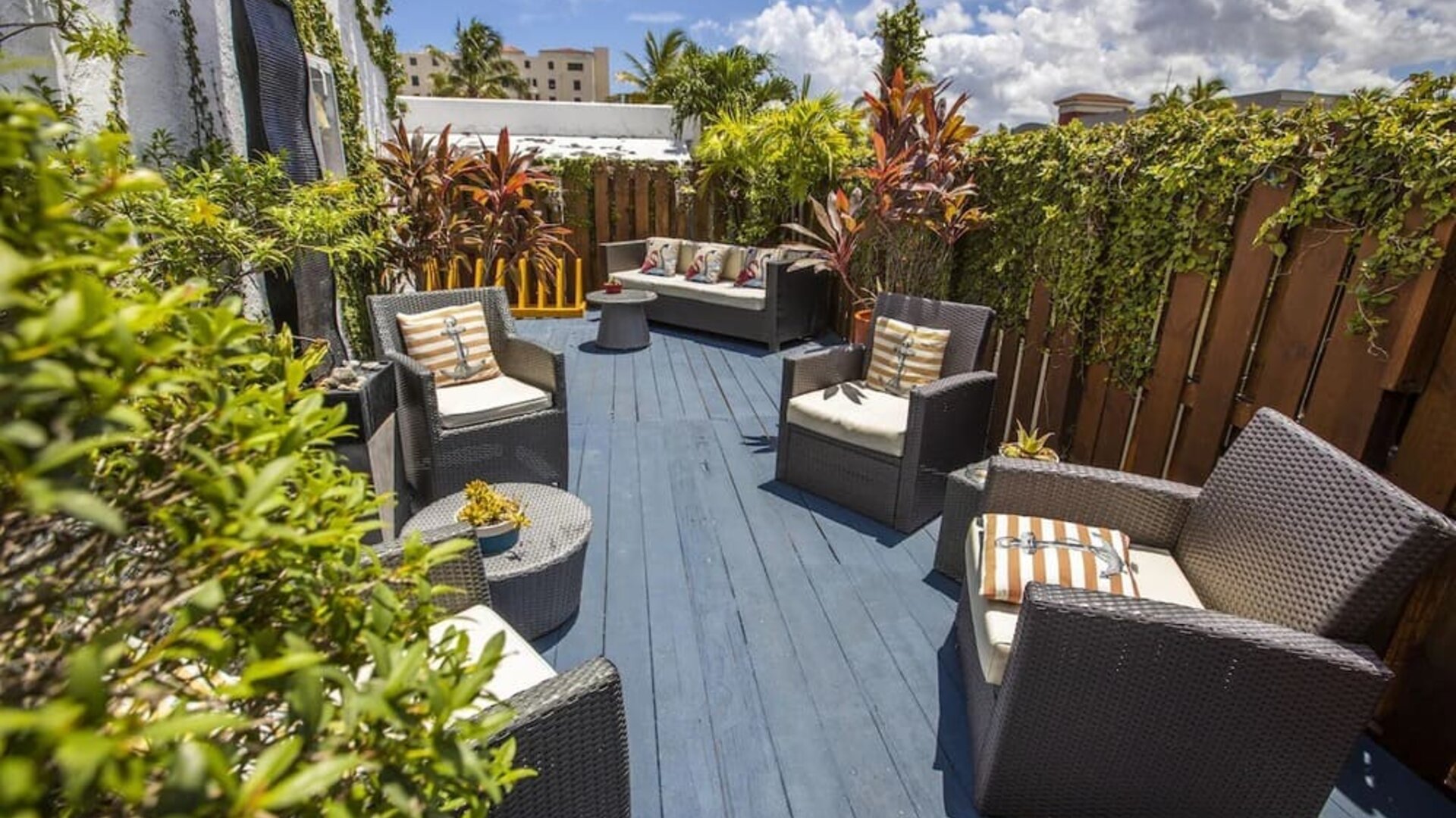 Comfortable outdoor meeting space at Hollywood Beach Suites, A South Beach Group Hotel.