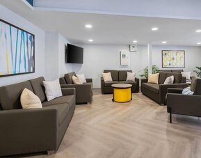 Hotel lounge with comfortable seating area at Comfort Inn Belleville.