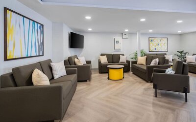 Hotel lounge with comfortable seating area at Comfort Inn Belleville.