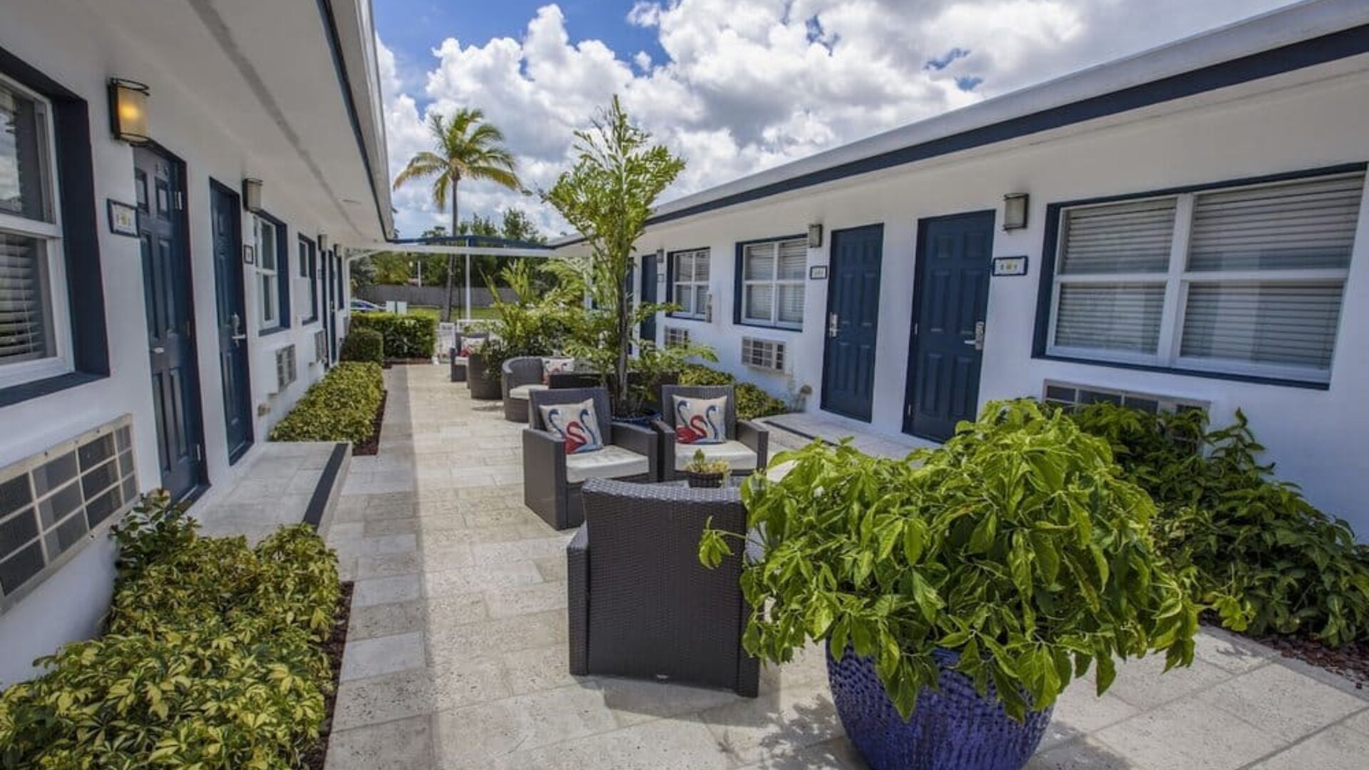 Relaxing outdoor terrace at Hollywood Beach Suites, A South Beach Group Hotel.