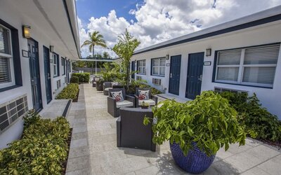 Relaxing outdoor terrace at Hollywood Beach Suites, A South Beach Group Hotel.