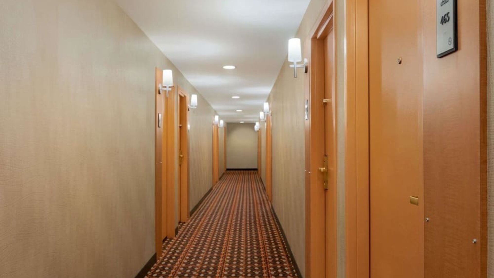 Guest hallway with room entrances at Days Inn Edmonton Downtown.
