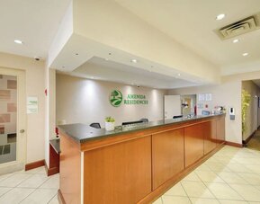 Hotel reception desk at Amenida Residences.