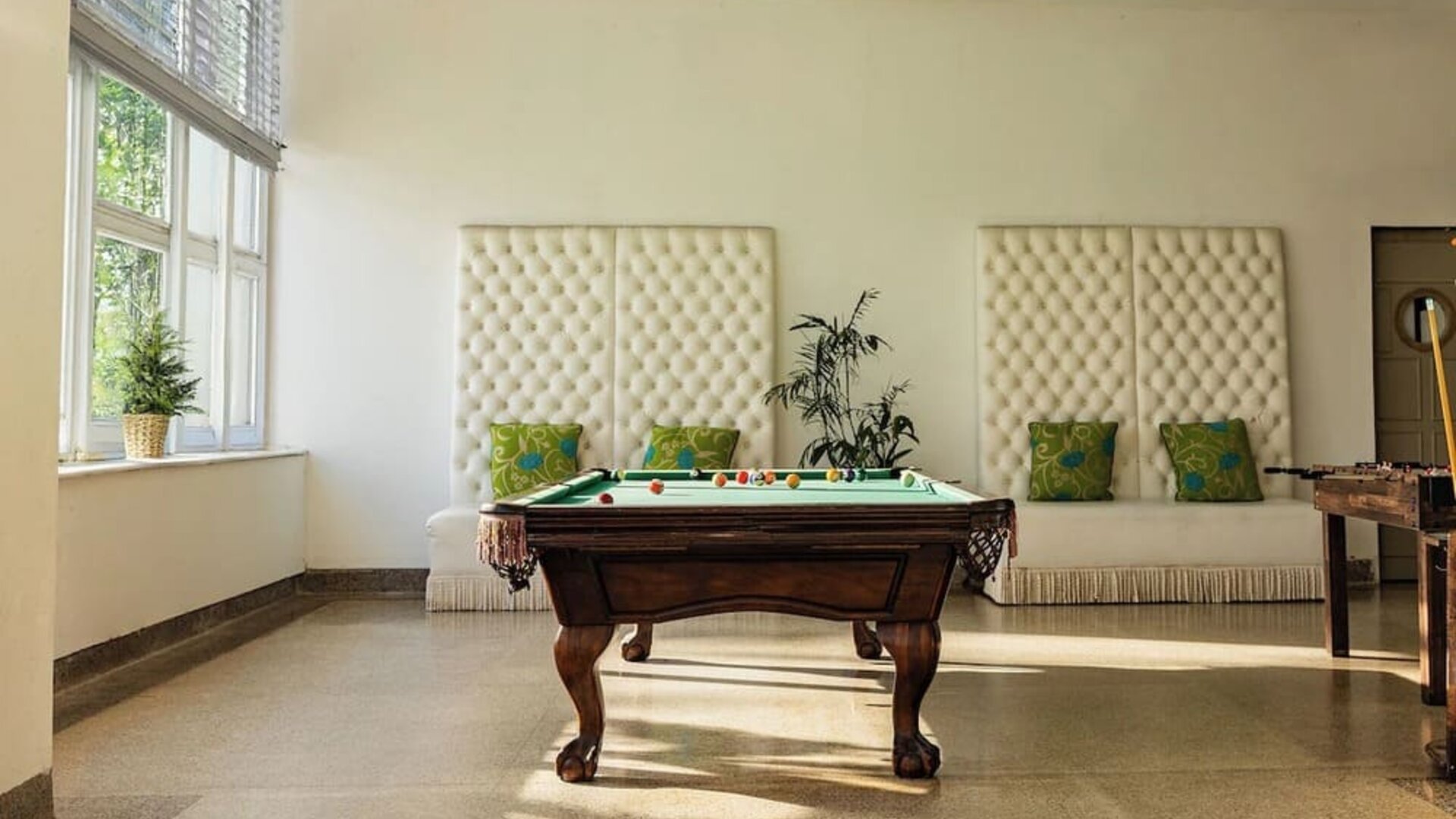 Hotel game room with a billiards table at Sherry Frontenac Oceanfront Hotel.
