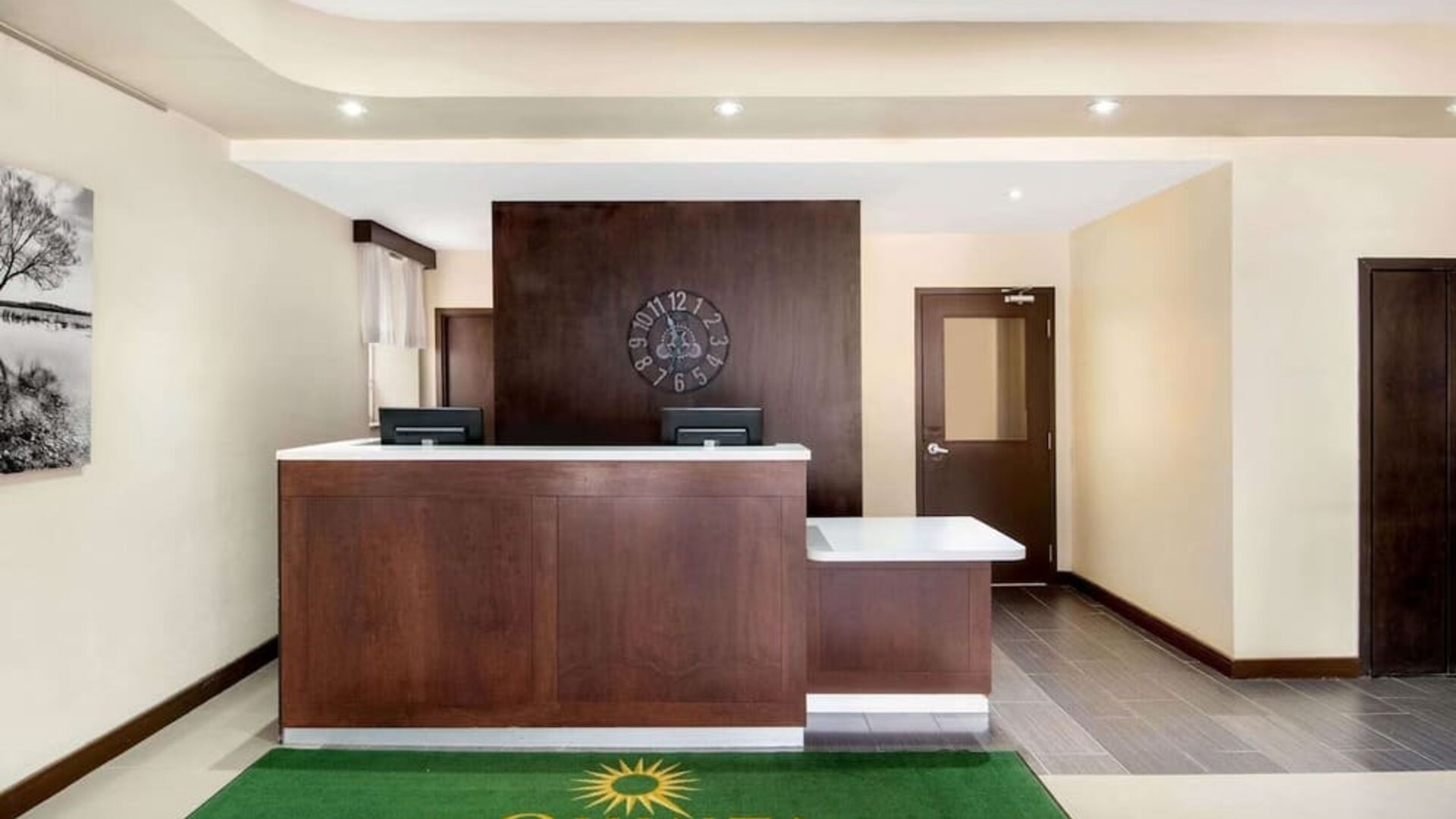Hotel reception desk at La Quinta Inn & Suites By Wyndham Oshawa.