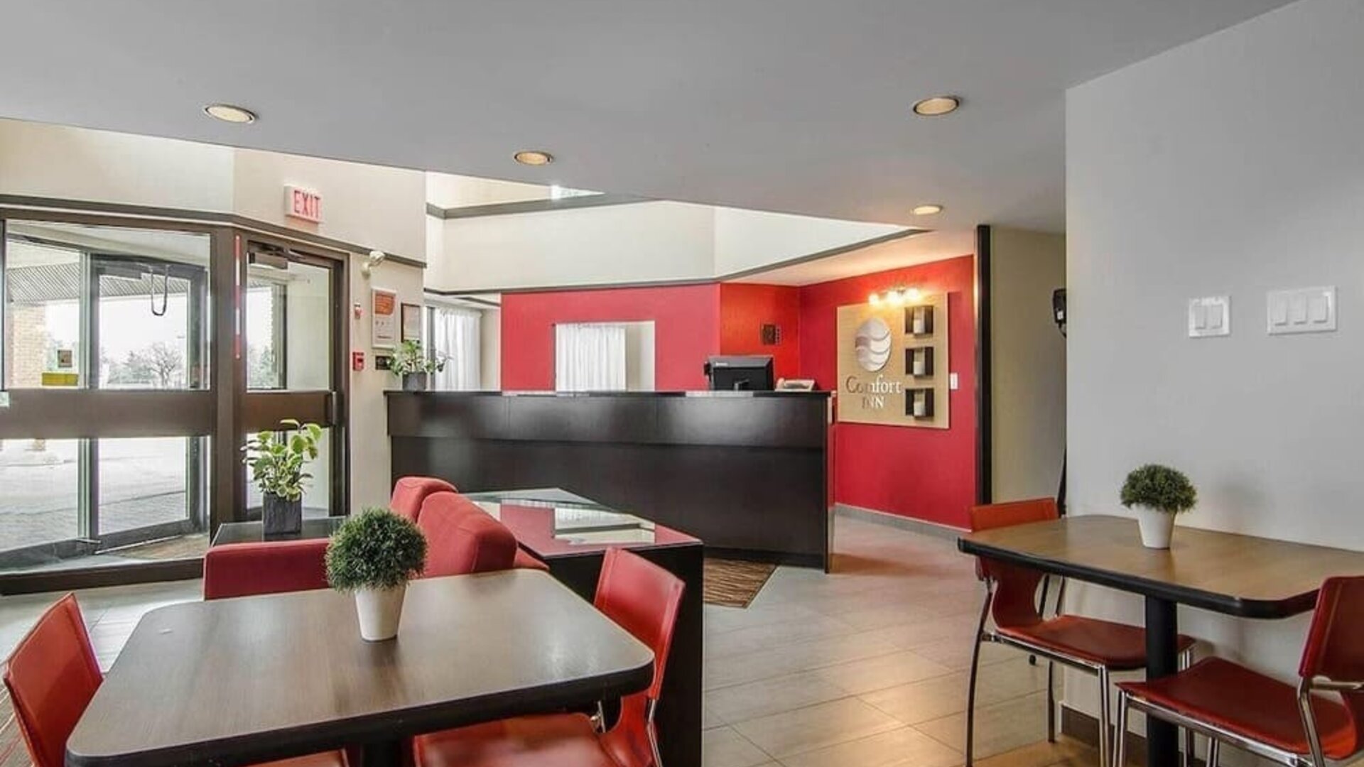 Hotel lobby with seating and reception desk at Comfort Inn Prince Albert.