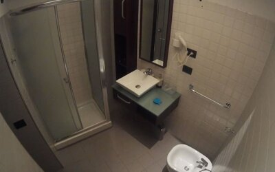 Spacious bathroom with bidet, vanity sink and complimentary toiletries at Dolce Vita Rooms & Breakfast.