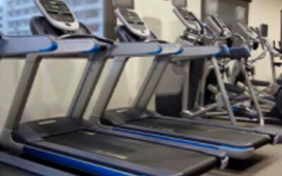 Fully equipped fitness center with treadmills and modern cardio equipment at Crowne Plaza Panama.