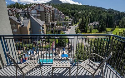 Room terrace with panoramic view at Hilton Whistler Resort & Spa.