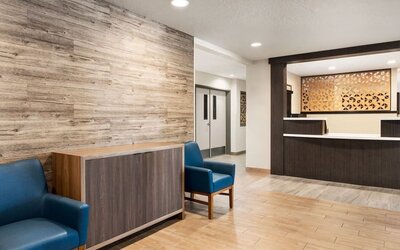 Welcoming lobby featuring contemporary seating, wood-inspired décor and a reception area designed for guest convenience at Candlewood Suites Meridian.