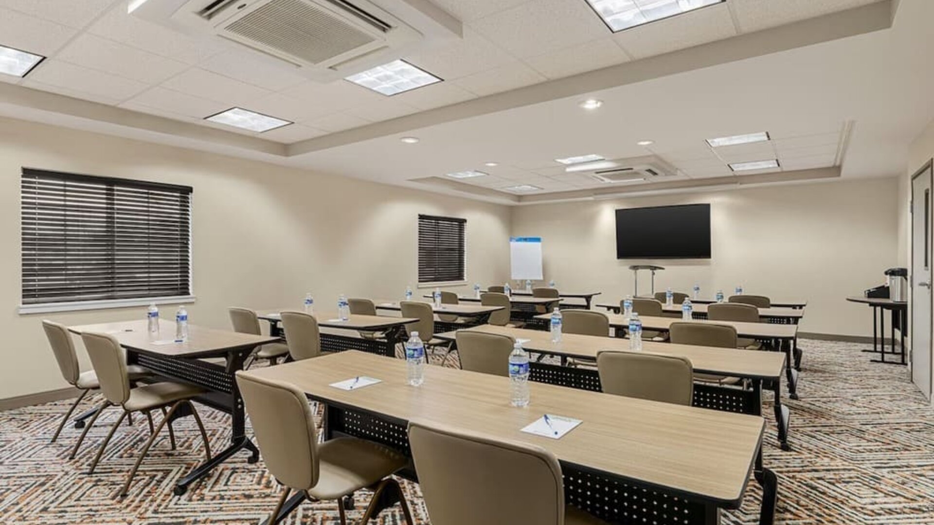 Meeting facility featuring classroom-style seating, presentation equipment and a flexible event space for business gatherings at Candlewood Suites Meridian.